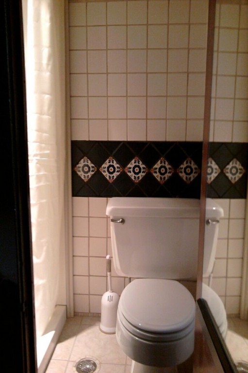 Mexican tile featured in the bath at KentSuites