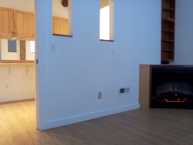 Corner Dimplex fireplace featured at KentSuites