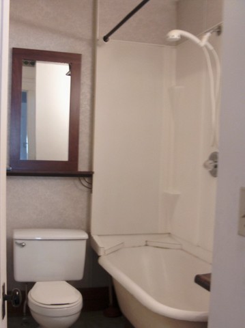 Vintange porcelain tub featured in this KentSuites unit